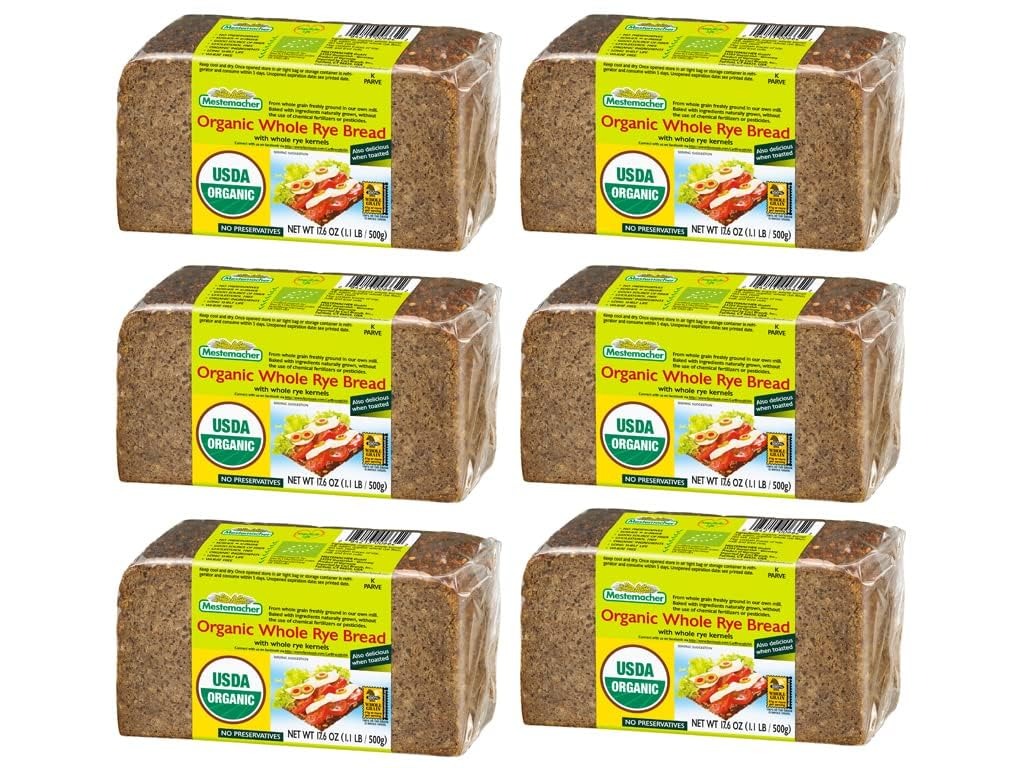 Six loaves of Mestemacher Organic Whole Rye Bread in clear plastic packaging with USDA Organic labels.