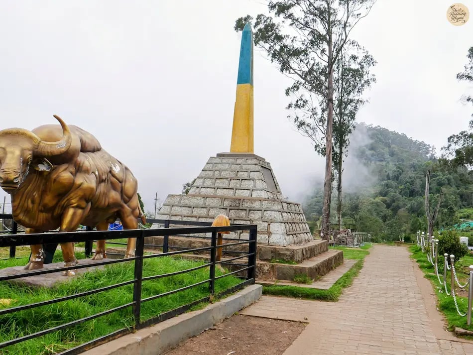 Pillar at Moir Point with misty hills in the background.