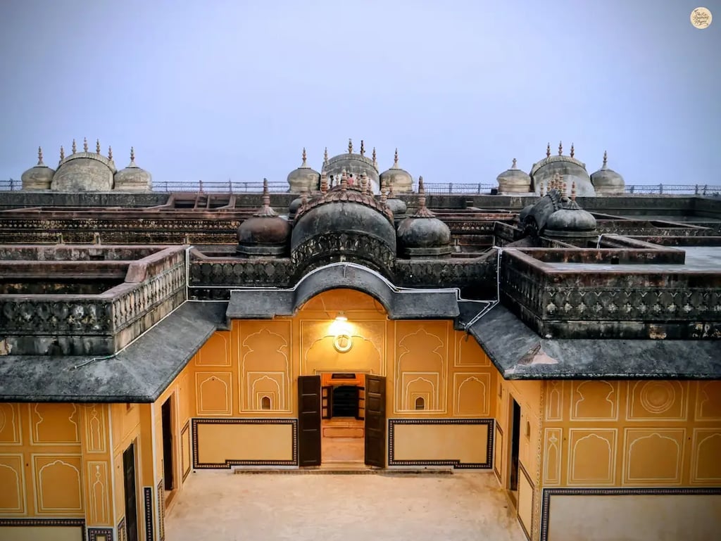 See the Sunset from the Rajput-style arches of Nahargarh Fort Jaipur, offering panoramic views of the Pink City at sunset.