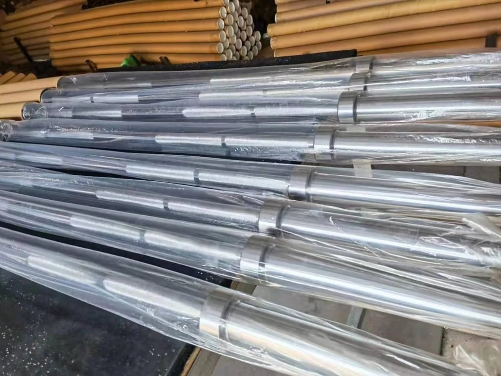 Finished barbells packaged for bulk shipment and wholesale distribution