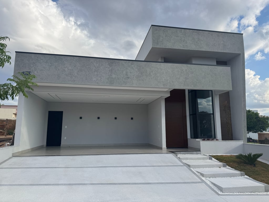 Residência térrea moderna com garagem e projeto estrutural residencial.