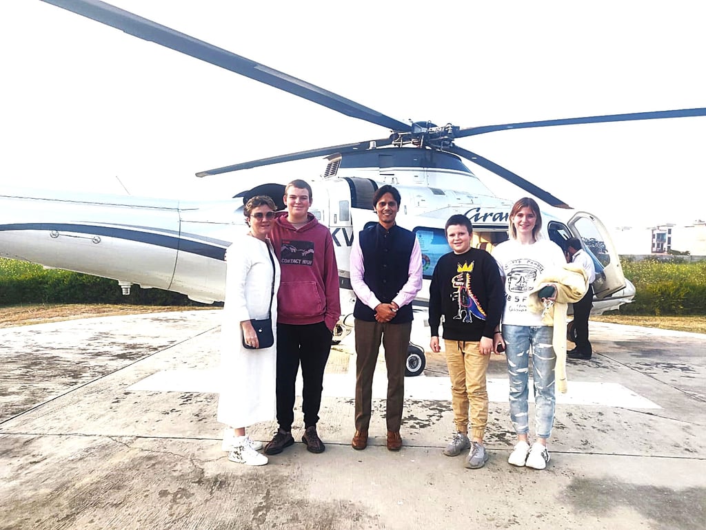 Muzammil (in the center) leading an exotic tour of Agra and Jaipur for a family travelling on their Private Jet