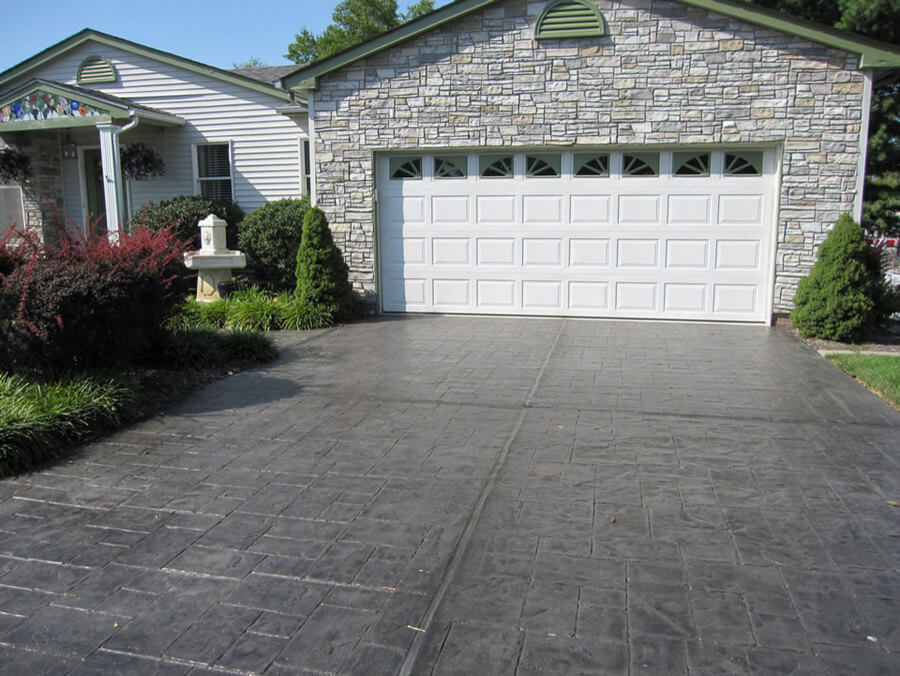 Dark gray stamped concrete driveway in Columbia, SC