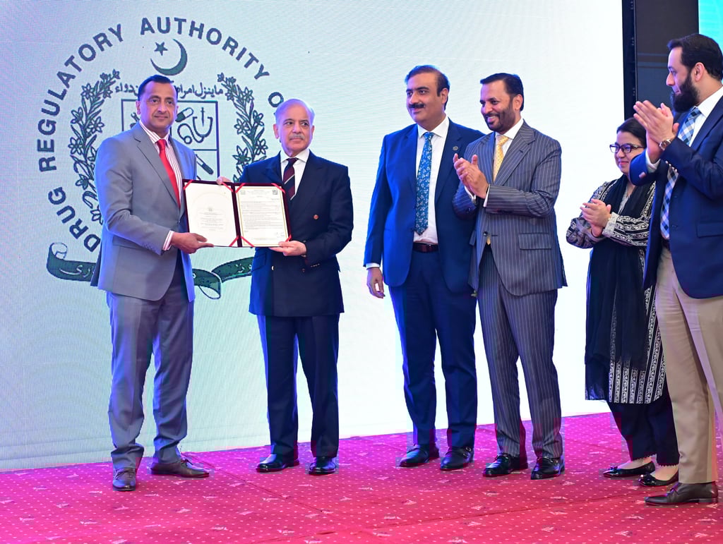 DRAP officials with PM and Health Minister during system launch