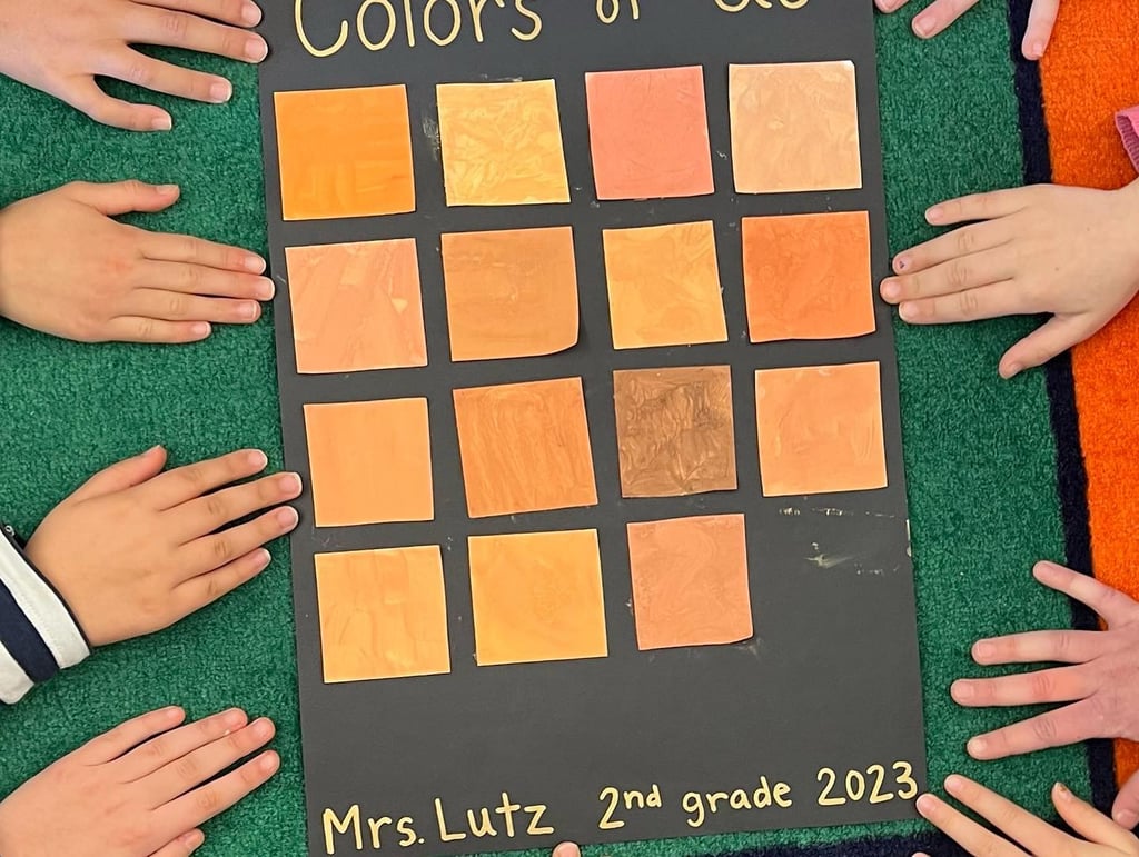classroom collage of painted swatches matching skin tones