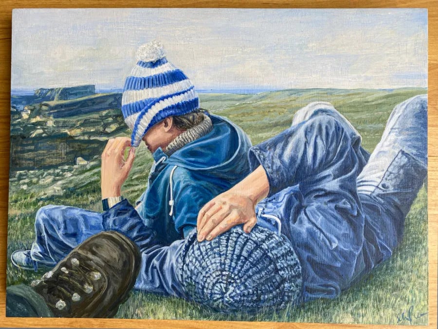 Oil portrait of two brothers lying on grass, painted in honour of brotherhood, memory and love