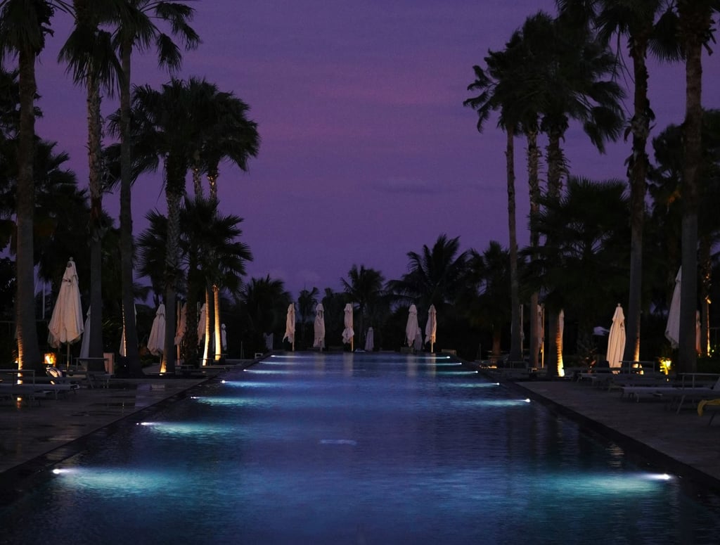 pool with low voltage lights at dusk