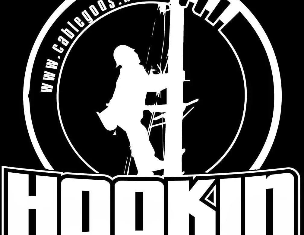 a man climbing a pole with the words hookin'n'n'ta