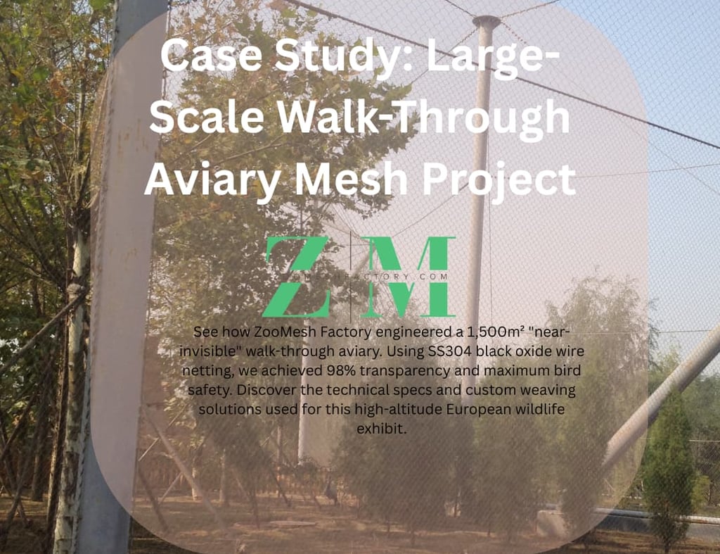 Aerial view of a large-scale walk-through aviary using black stainless steel cable mesh.