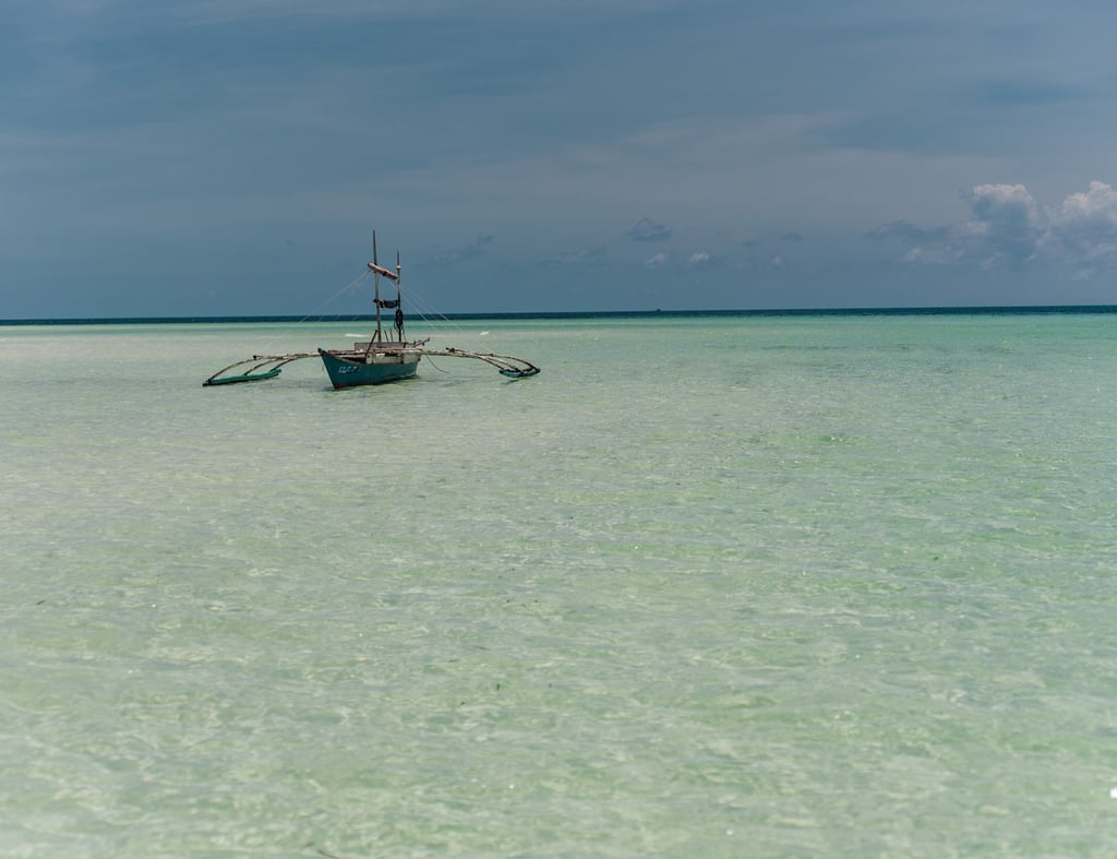 a boat in the water with a boat in the water