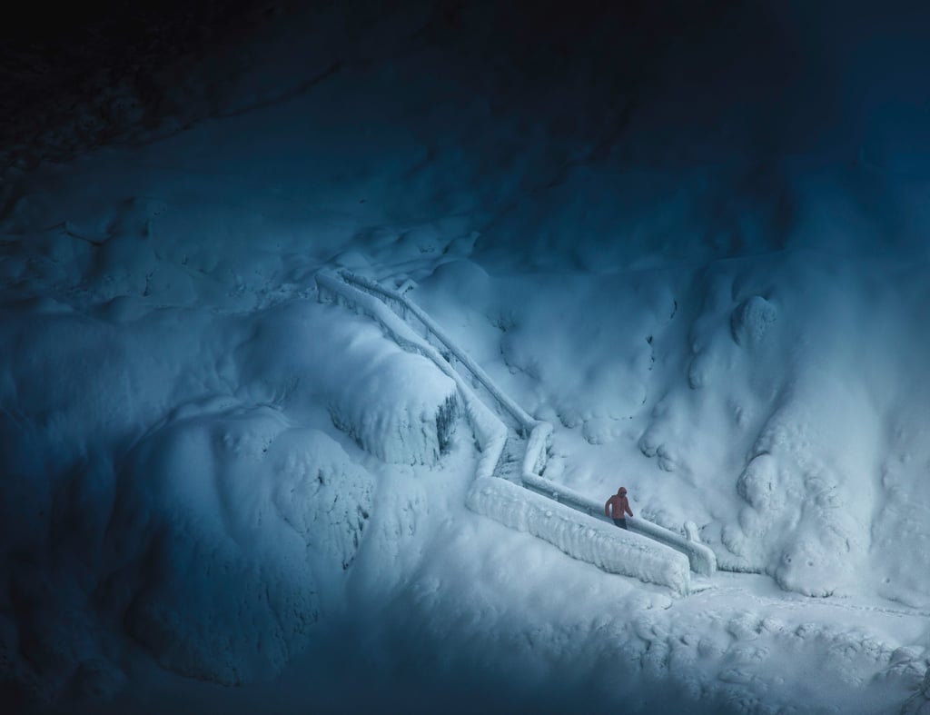 a person walking on icy stairs