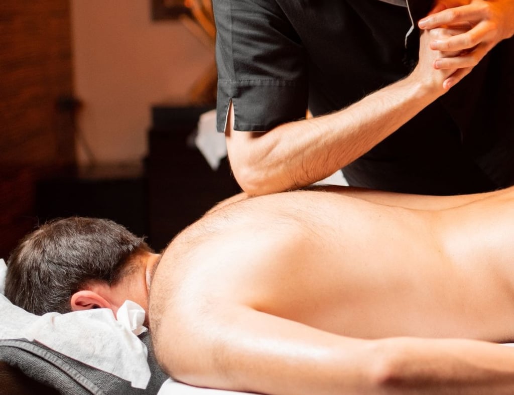 a man getting a massage at a spa