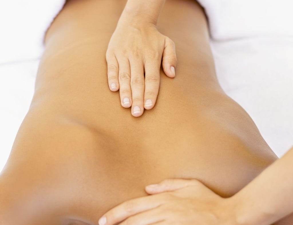 a woman getting a massage at a massager