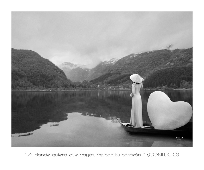 a woman in a white dress standing on a boat