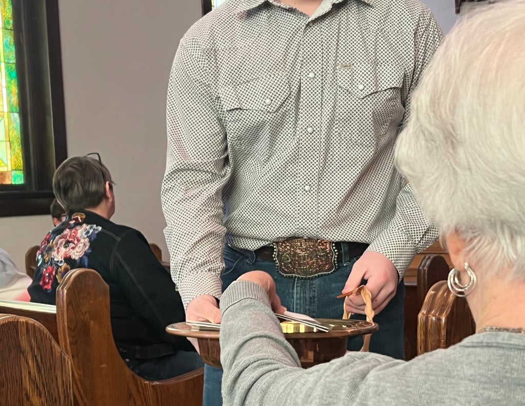 Moran United Methodist Church offering donations during Sunday's worship