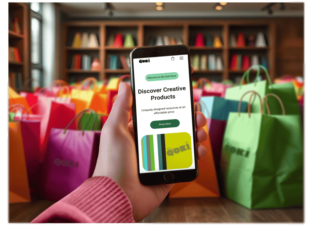 hand holding cell phone in front of shopping bags