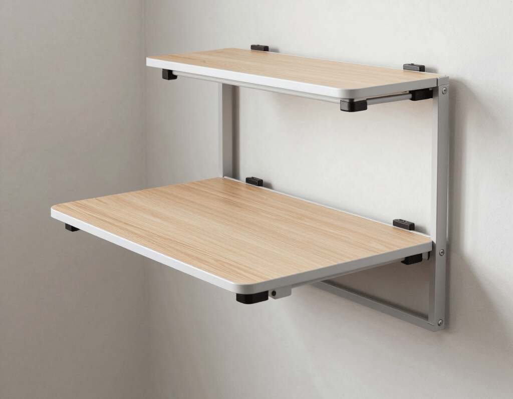 A foldable wall mounted desk being opened and closed, demonstrating flexible use of space in a small