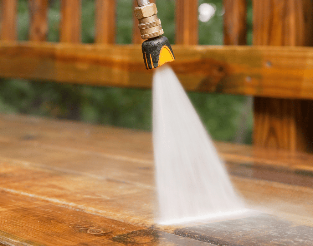 pressure washer washing a homeowners deck
