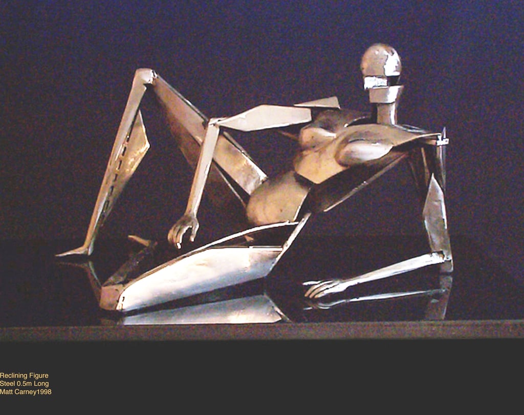 a chrome plated steel sculpture of a futuristic woman reclining