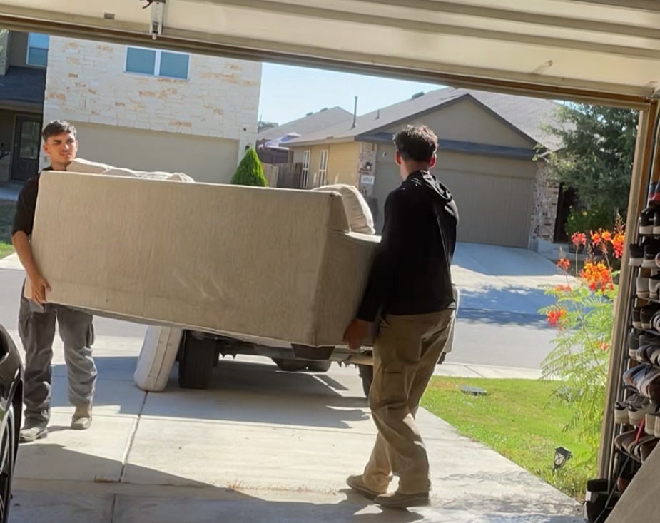JP and Alexinf Removing a Couch In San Antonio