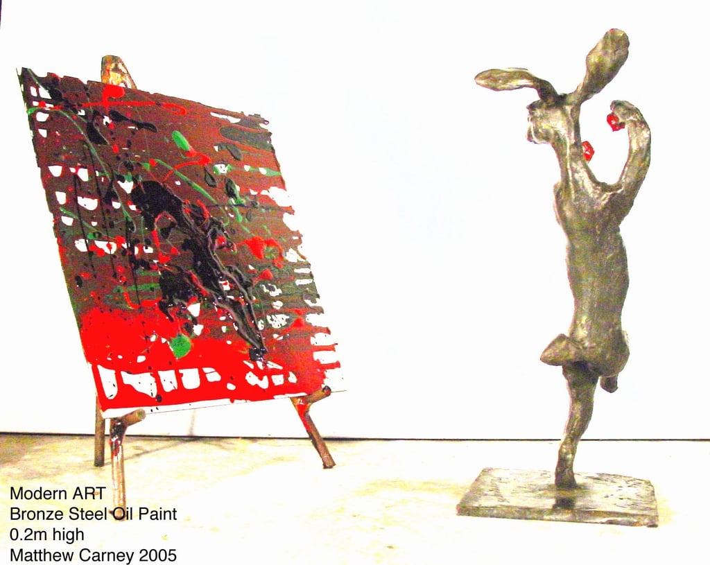a sculpture of a rabbit throwing paint at a canvas