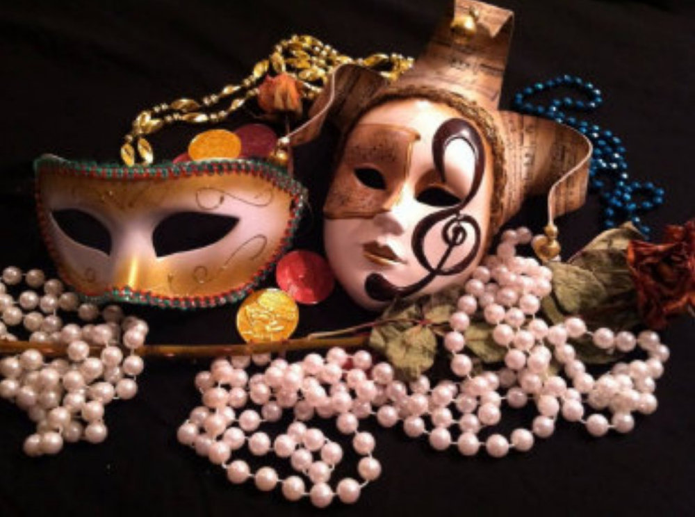 Hiptwist on Bourbon Street graphic of Mardi Gras masks and beads