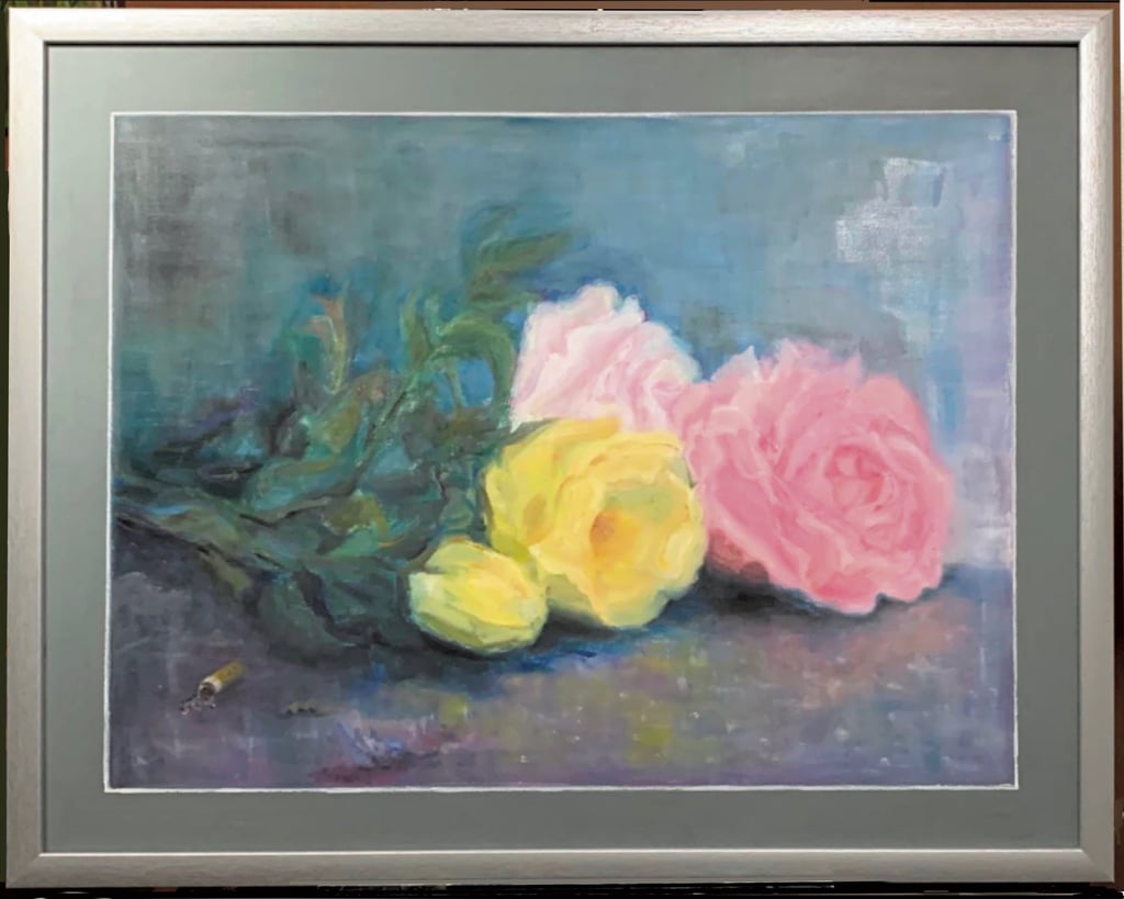 Discarded bouquet of tender roses lying on the pavement