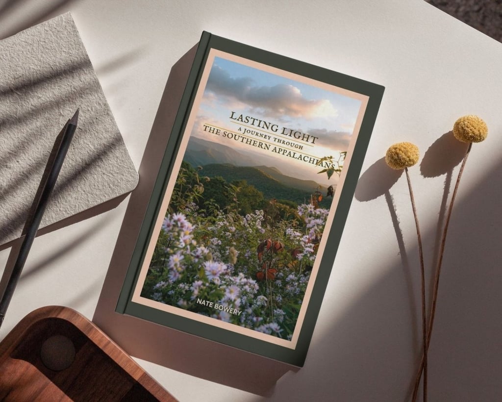 Lasting Light: A Journey Through the Southern Appalachians photography book by Nate Bowery on a desk.