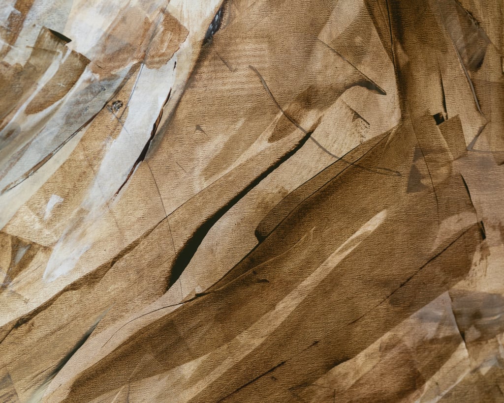 Abstract oil painting on canvas featuring earthy brown brushstrokes and textured neutral tones.