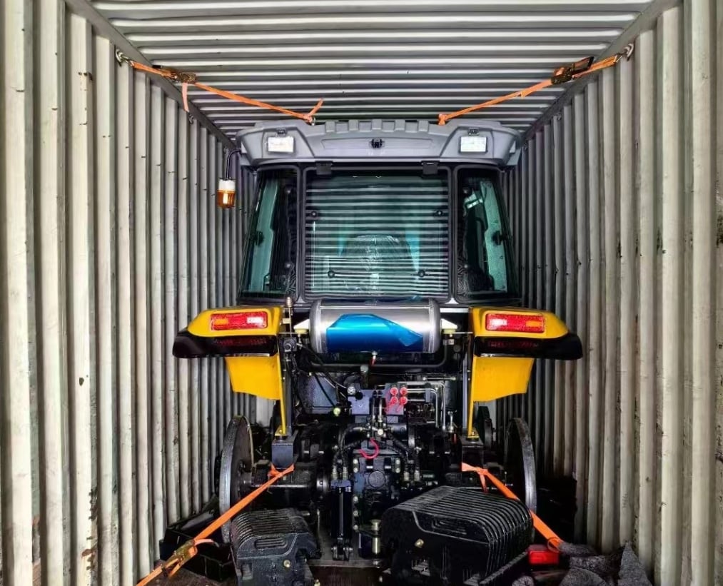 a tractor trailer with a tractor inside of it