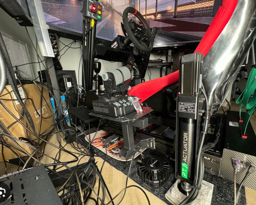 https://www.reddit.com/r/simracing/comments/19bgpz0/cable_management_nightmare_bi_polar_sim_build/