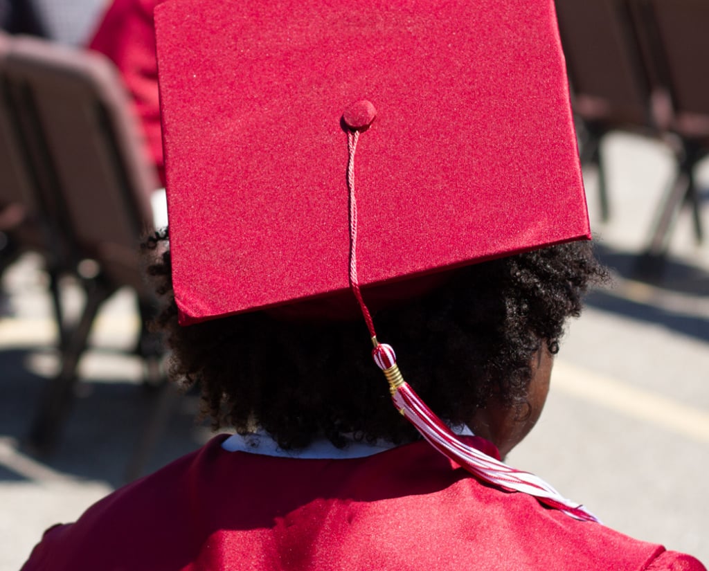 High School Senior in DMV wearing graduation cap