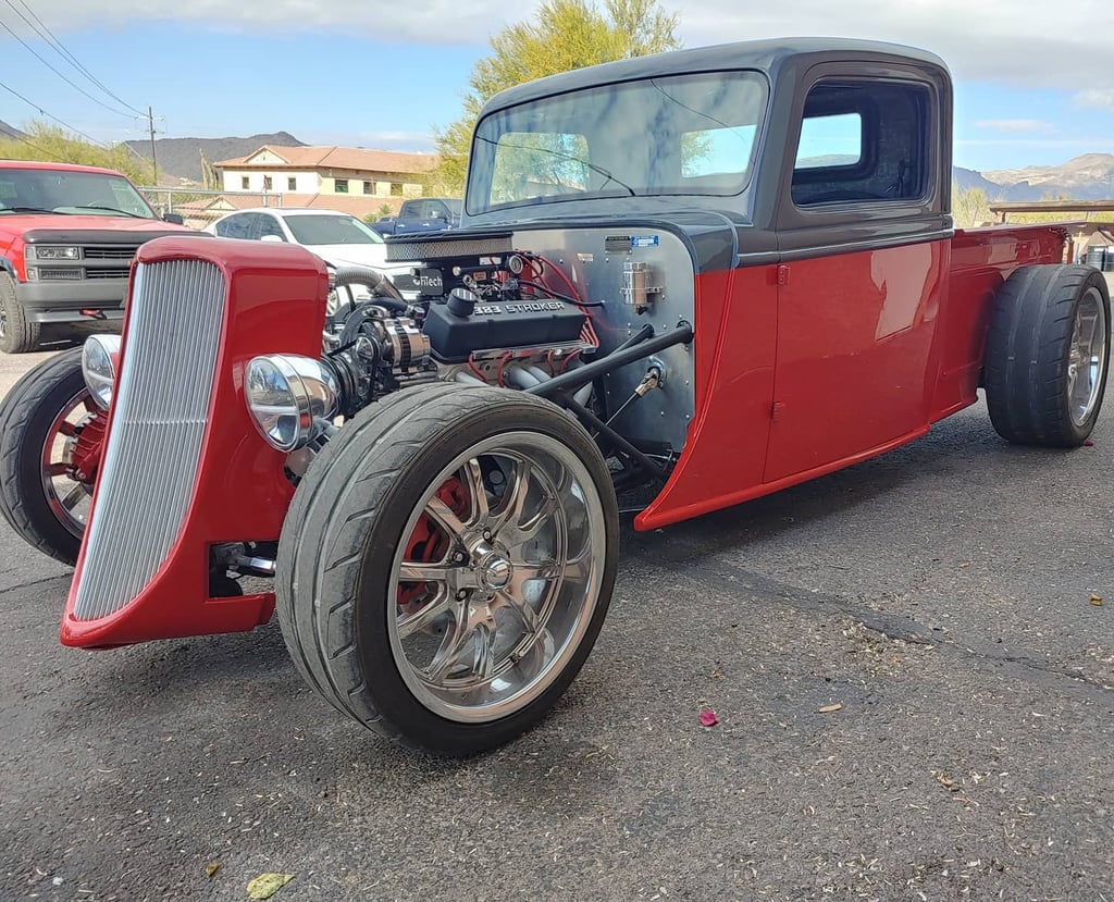 A Custom-built hot rod truck with an updated engine and powertrain.