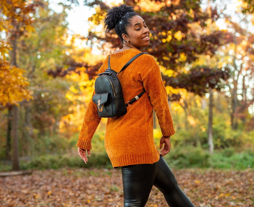 Alexandria VA and Fort Washington MD Family Photographer and picture of women in orange sweater. s