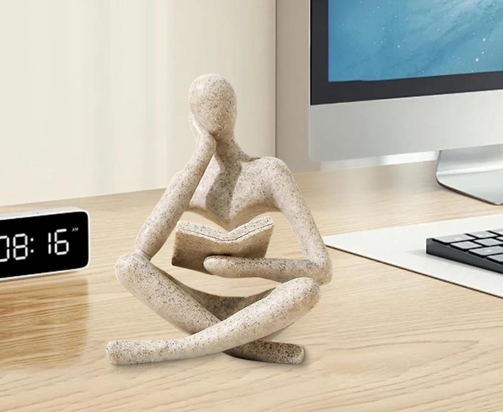 Modern Thinker Statue placed on a bookshelf as a stylish home decor accent