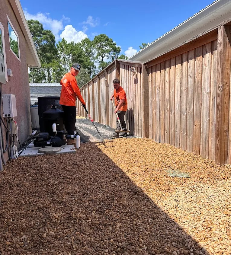 coastal creations landscaping team working in client yard