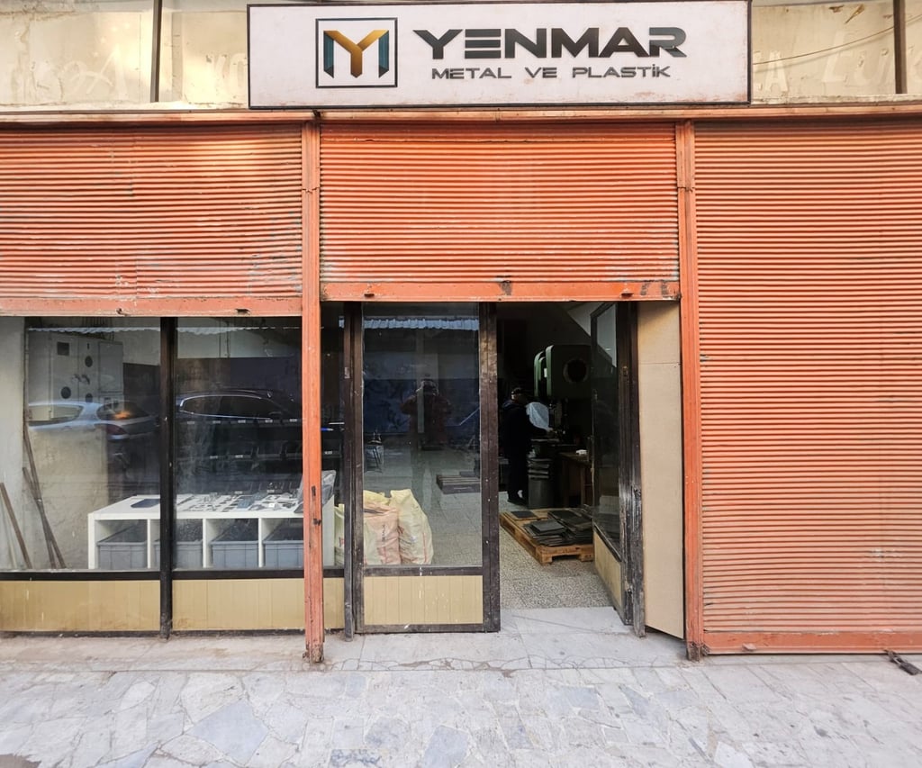 a storefront door with a sign that says yyyyyyy