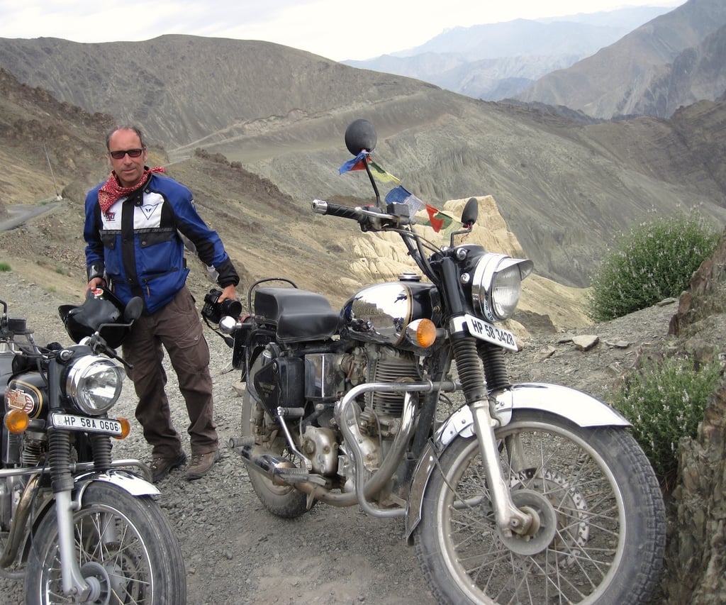 Diego Escriva de Romani leading a motorcycle tour high in the Himalayas