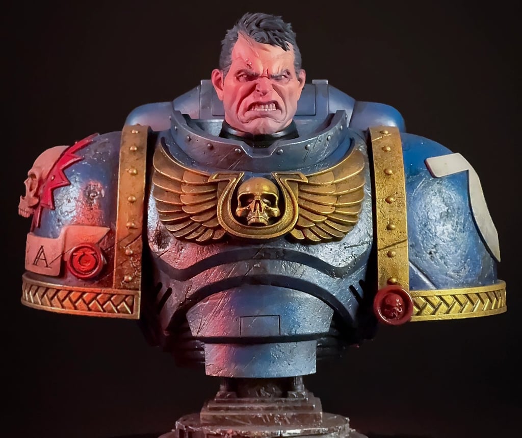 Custom painted Captain Titus Space Marine bust featuring Ultramarines blue armor, gold Aquila chest
