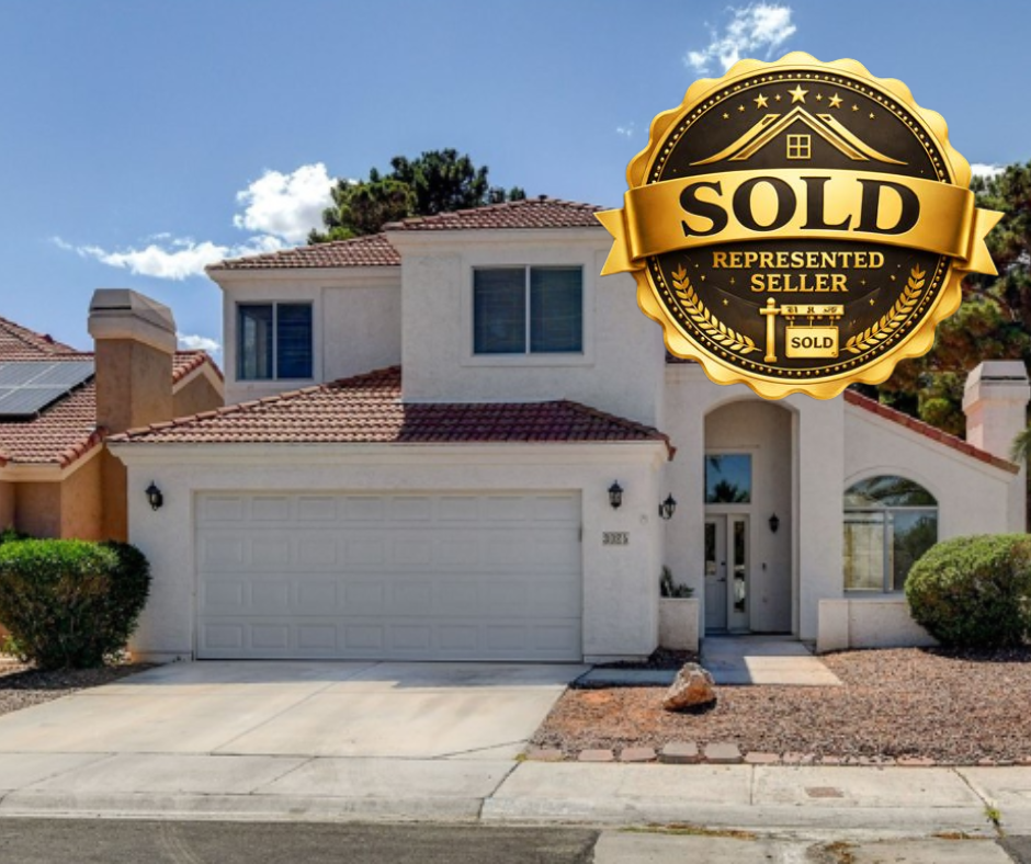 a sold sign that says sold in the foreground