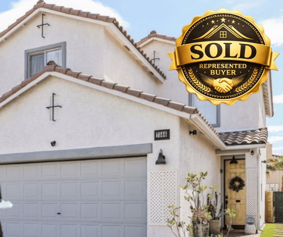 a house with a sold sign and a sold sign