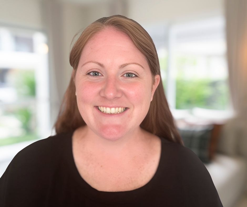 a woman with a smile on her face