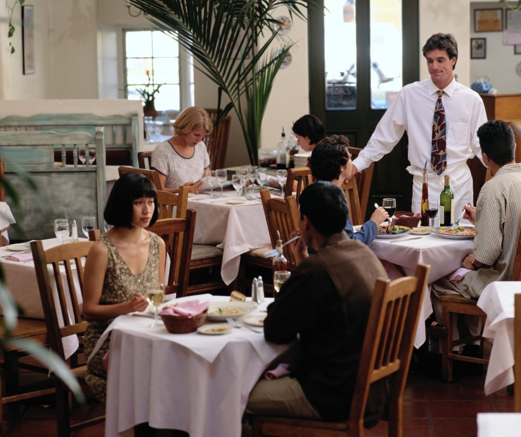 People sitting in a restaurant to connote restaurant AI