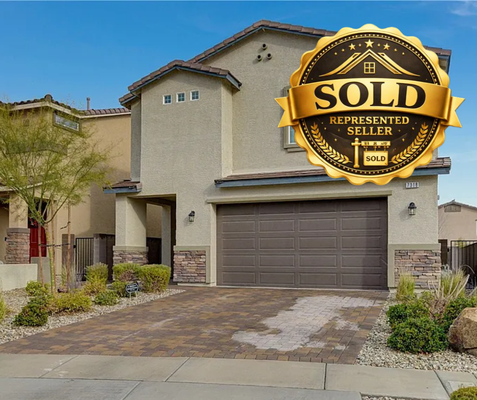 a home with a sold sign on the front of a house
