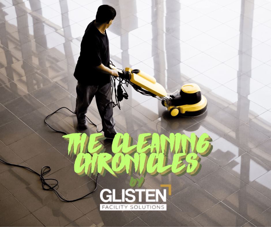 A clean, modern lobby with a janitor polishing floors.