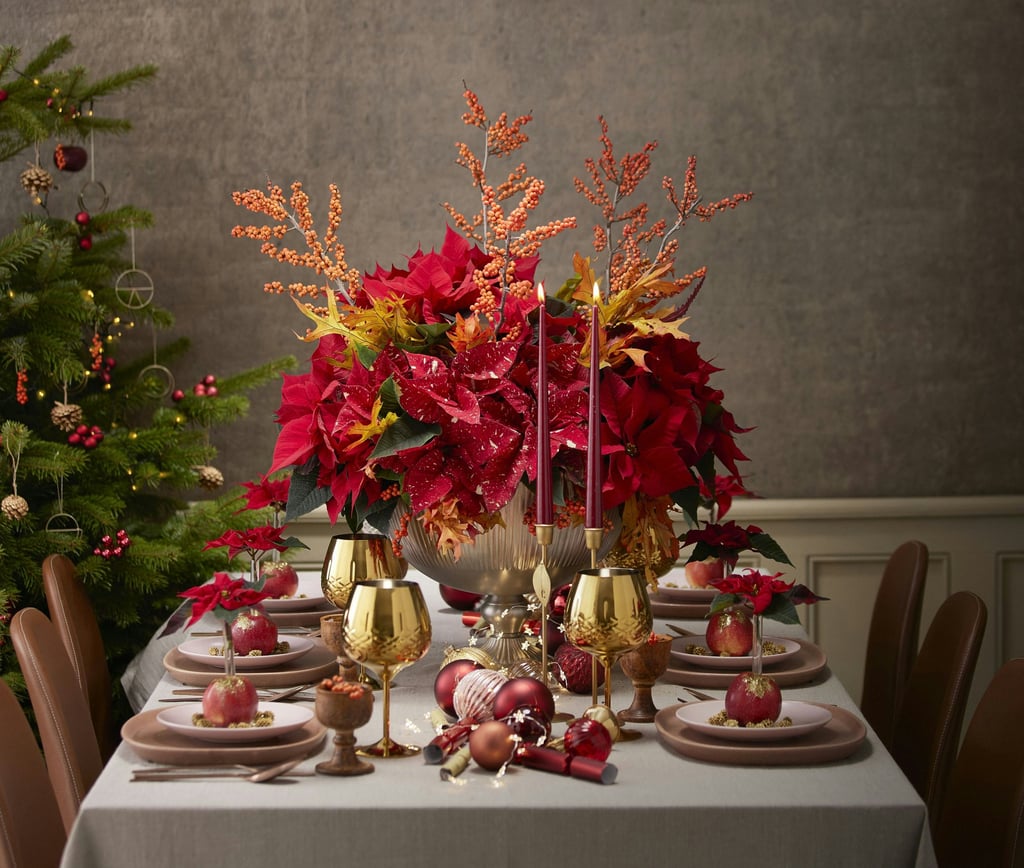 a table with a christmas tree and a christmas tree