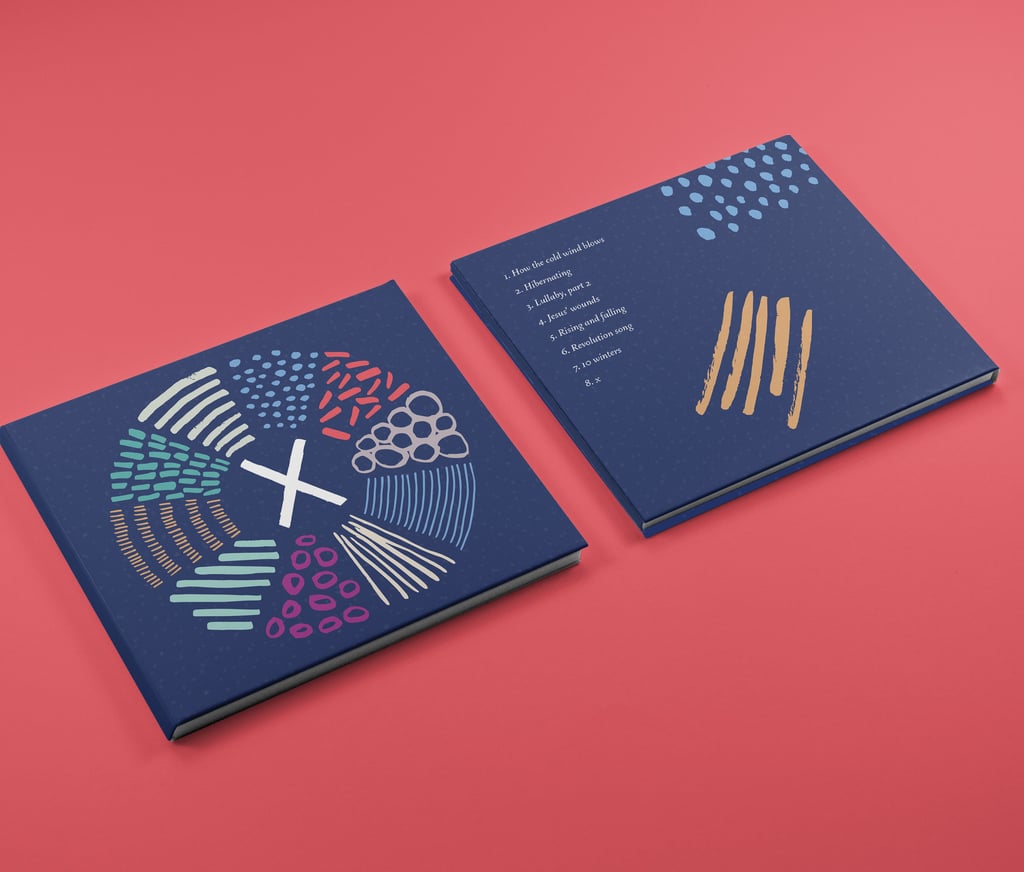 The front and back of a CD case laid out on a red background.