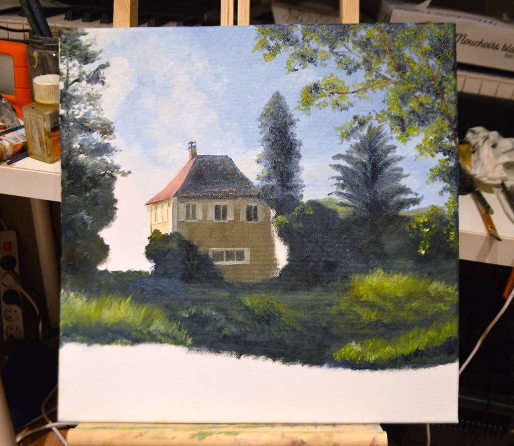 an unfinished painting of a house in a studio