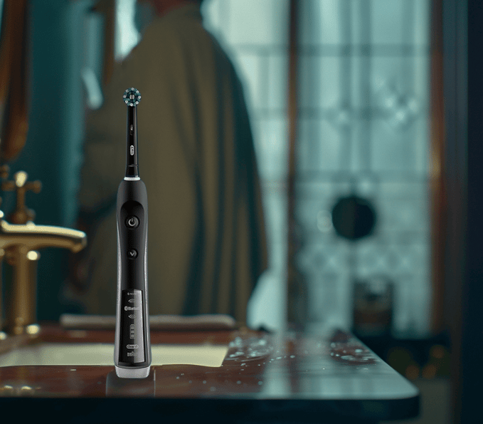 a toothbrush and a toothbrush on a table