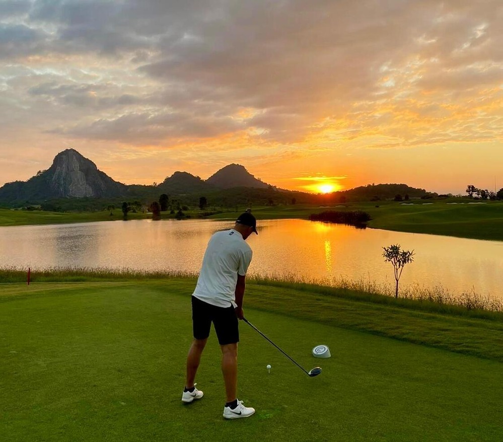 Man on golf course in Thailand holiday curated by Francesco Luxury Travels Villas Weddings